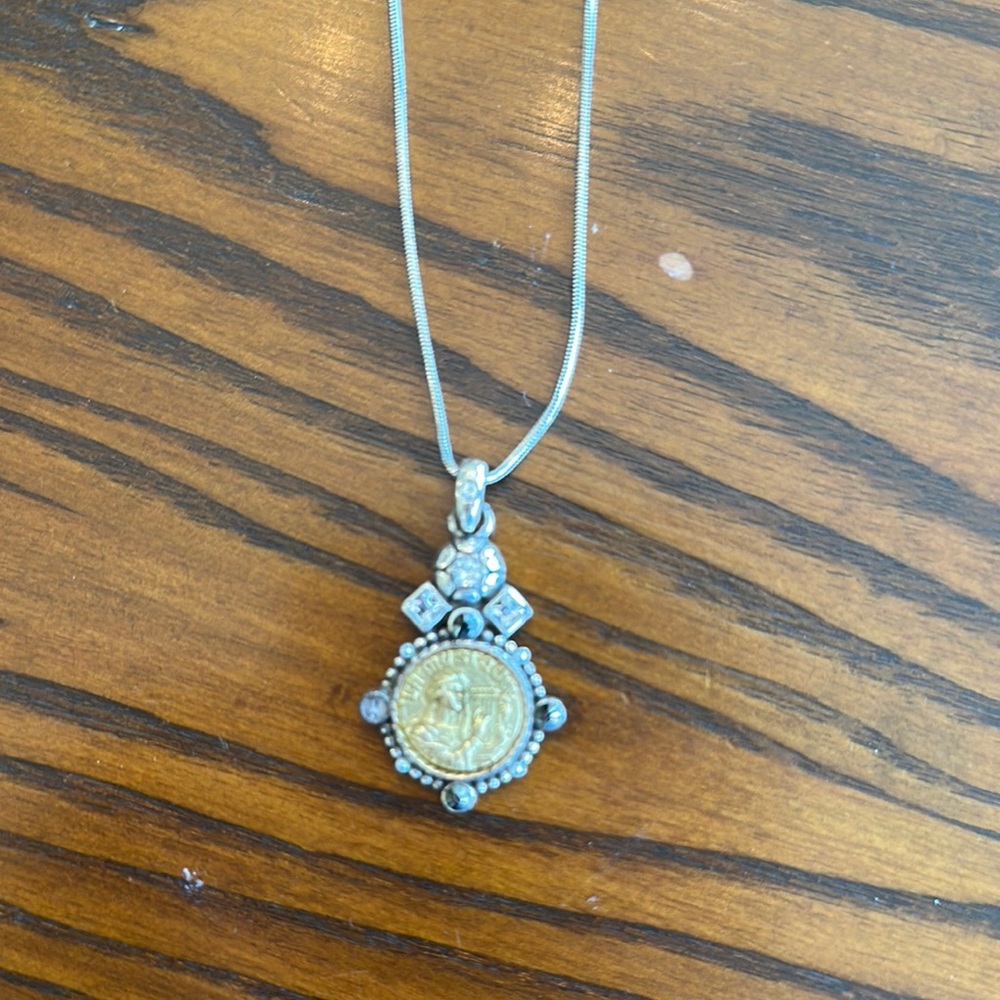 Elegant Gold and Silver Pendant Necklace